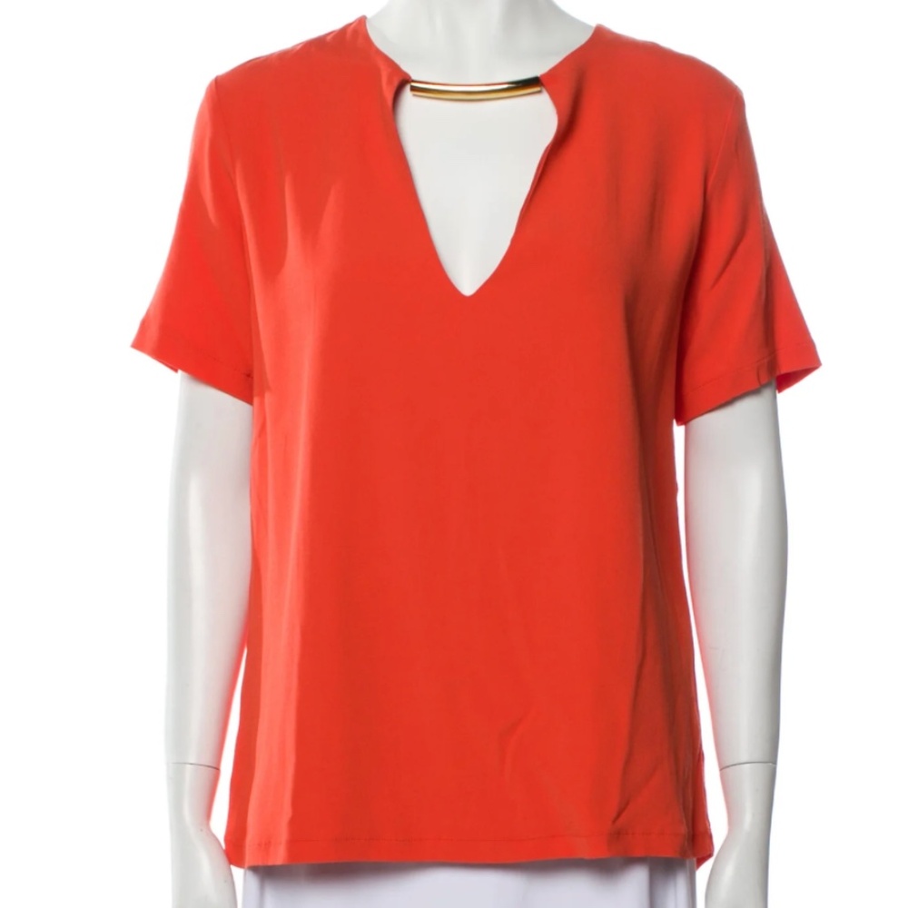 Alexis short sleeve orange top with gold bar, size medium